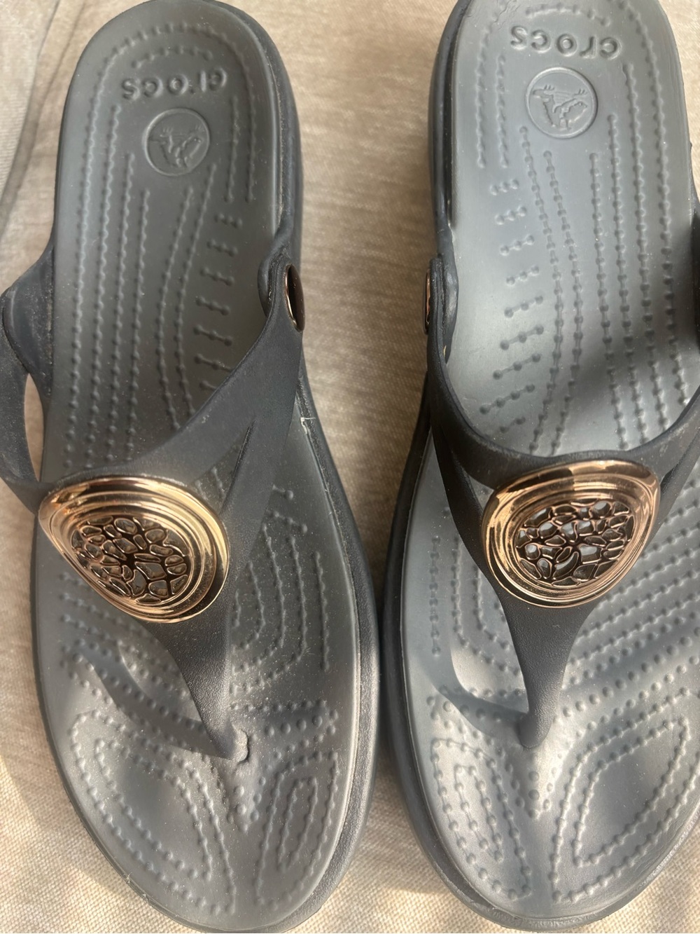 CROCS Gray and Black  Slip-On Thong Sandals with Metallic Medallion